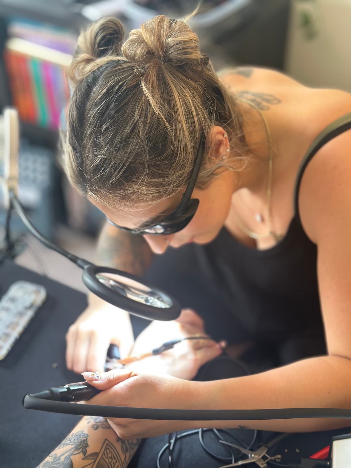 Jenna welding a permanent bracelet